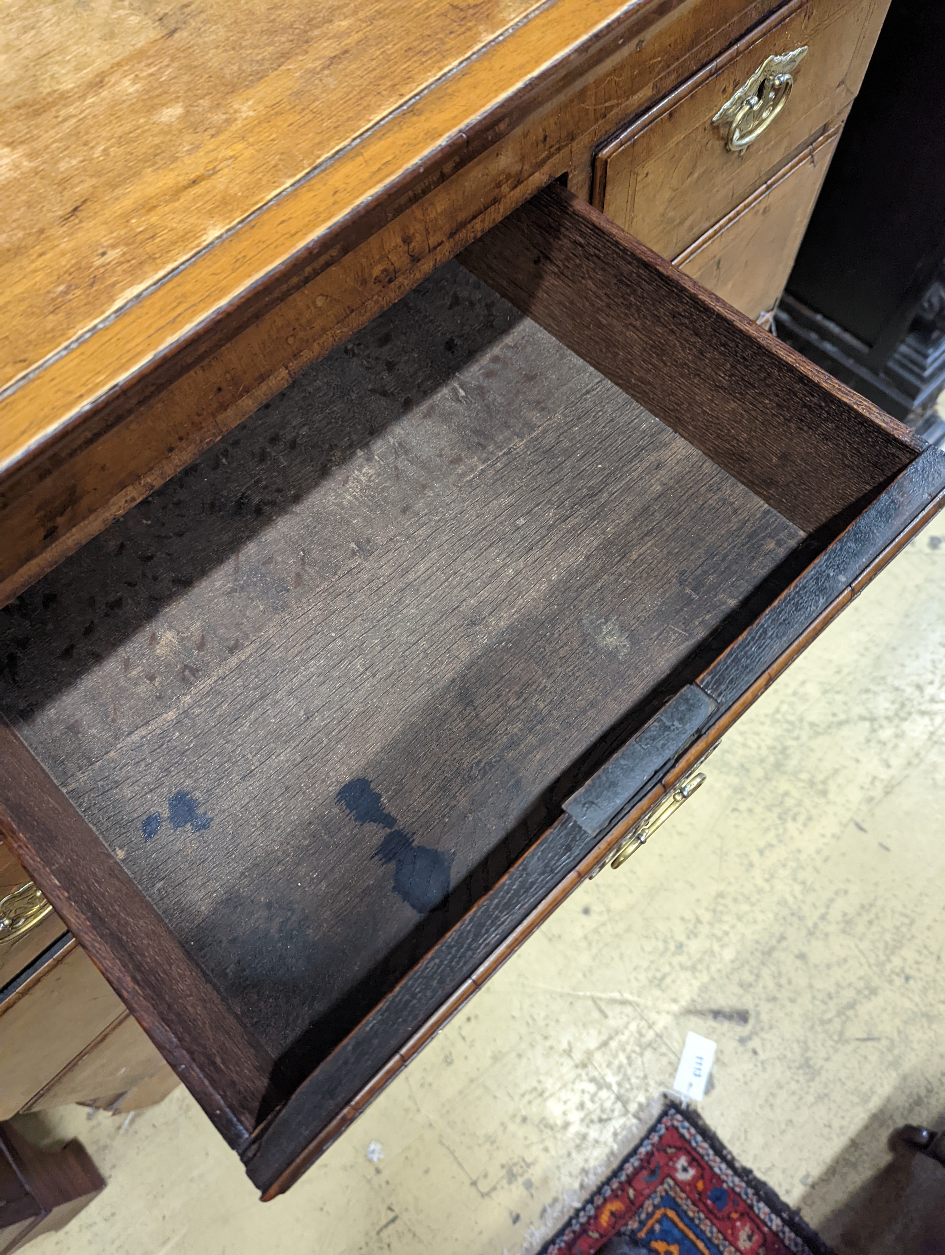 An 18th century and later walnut chest, (formerly a tallboy section) width 107cm, depth 54cm, height 107cm